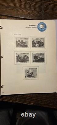 4 Disney Postage Stamp Album The World of Disney Collection With 238 Stamps