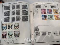 A 64 year stamp collection hundreds of mint new & used stamps (worldwide)