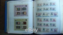 Arabia Trucial States stamp collection in Minkus album with 1,000s or so to'97