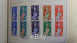Arabia Trucial States stamp collection in Minkus album with 1,000s or so to'97
