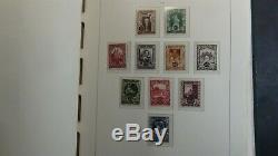 Austria stamp collection in Lighthouse hingeless album withest. 1,208 or so MNH