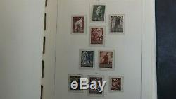 Austria stamp collection in Lighthouse hingeless album withest. 1,208 or so MNH