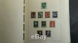 Austria stamp collection in Lighthouse hingeless album withest. 1,208 or so MNH