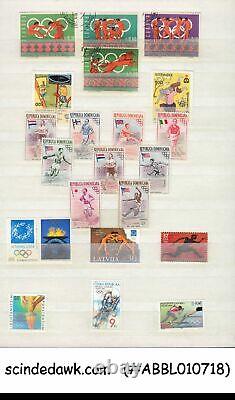 Collection Of Olympic Stamps From Various Countries In An Album