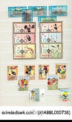 Collection Of Olympic Stamps From Various Countries In An Album