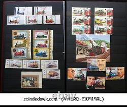 Collection Of Worldwide Stamps Of Railway Locomotives In An Album
