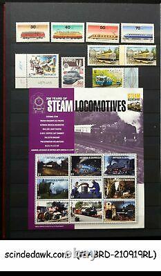 Collection Of Worldwide Stamps Of Railway Locomotives In An Album