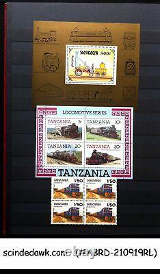 Collection Of Worldwide Stamps Of Railway Locomotives In An Album