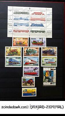 Collection Of Worldwide Stamps Of Railway Locomotives In An Album