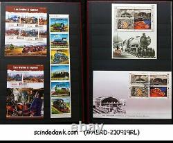 Collection Of Worldwide Stamps Of Railway Locomotives In An Album