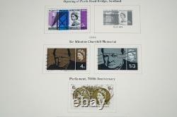 GREAT BRITIAN 1880s-1980s COLLECTION OF 1,050+ STAMPS MINT & USED IN SCOTT ALBUM