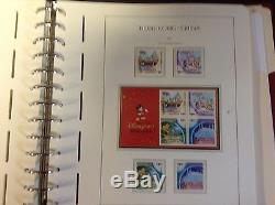 Hong Kong Collection 1996-2004 in Lighthouse Hingless Album, SCV Around $400
