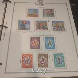 LAOS, Amazing Stamp Collection mounted on Minkus International pages. Elegant