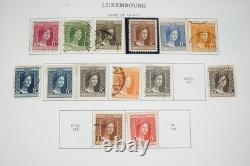 LUXEMBOURG 1870s-1970s COLLECTION OF 1,100+ STAMPS MINT & USED IN MINKUS ALBUM