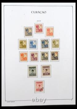 Lot 40509 Almost complete stamp collection Cura? Ao 1873-1976 in Kabe album