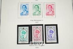 MOROCCO 1890s-2000s COLLECTION OF 1,500+ STAMPS STORED IN LARGE ALBUM