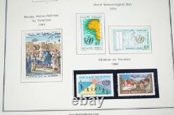 MOROCCO 1890s-2000s COLLECTION OF 1,500+ STAMPS STORED IN LARGE ALBUM