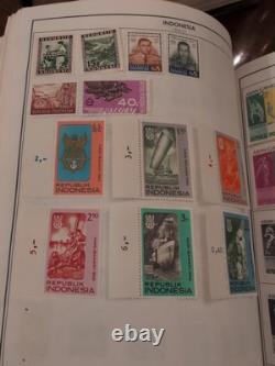 Massive Two Volume Worldwide Stamp Collection In HE HARRIS ALBUMS. Magnificent