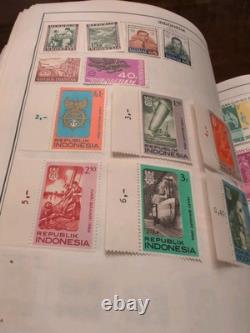 Massive Two Volume Worldwide Stamp Collection In HE HARRIS ALBUMS. Magnificent
