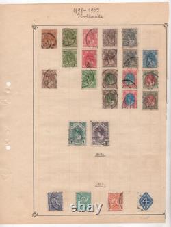 NETHERLANDS 1864-1950s COLLECTION OF 145 STAMPS ON OLD ALBUM PAGES ALL USED