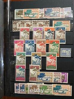New Caledonia Stamps in Stock Album 98% Mint OG From 1892-1988 (CV $580+)