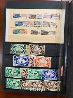 New Caledonia Stamps in Stock Album 98% Mint OG From 1892-1988 (CV $580+)