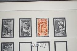 SAAR 1920s-1950s COLLECTION OF 125+ STAMPS MINT & USED IN LINDNER ALBUM