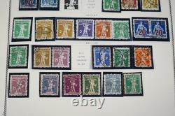 SWITZERLAND 1860s-1970s COLLECTION OF 1,000+ STAMPS STORED IN SCOTT ALBUM