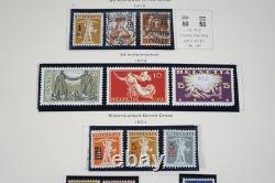 SWITZERLAND 1860s-1970s COLLECTION OF 1,000+ STAMPS STORED IN SCOTT ALBUM