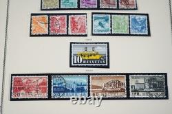 SWITZERLAND 1860s-1970s COLLECTION OF 1,000+ STAMPS STORED IN SCOTT ALBUM