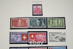 SWITZERLAND 1860s-1970s COLLECTION OF 1,000+ STAMPS STORED IN SCOTT ALBUM
