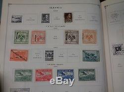 Scott International Jr Blue Album Collection 1,500 diff. Stamps copyright 1933