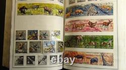 Stampsweis WW collection in two thick Harris Standard albums with est 16k stamps