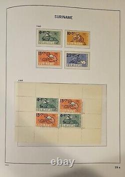 Suriname Collection in Davo Hingeless Album Vol. 1 With Stamps Mostly Mint NH