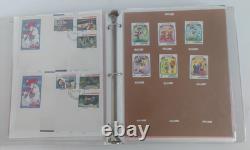 The Disney World of Postage Stamps Album with Aprox 250 Total Stamps