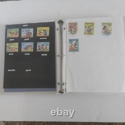 The Disney World of Postage Stamps Album with Aprox 250 Total Stamps