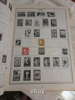 The New Statesman Deluxe H. E. Harris Stamp Album With Stamps