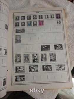 The New Statesman Deluxe H. E. Harris Stamp Album With Stamps