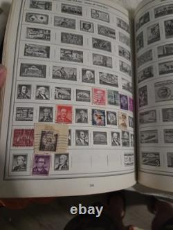 The New Statesman Deluxe H. E. Harris Stamp Album With Stamps