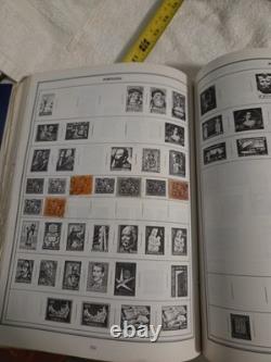 The New Statesman Deluxe H. E. Harris Stamp Album With Stamps
