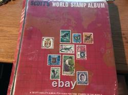 Two stamp albums with partial filled pages