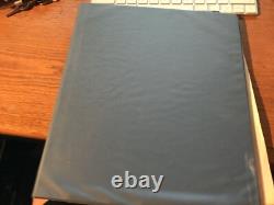 Two stamp albums with partial filled pages