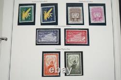 UN 1950s-1980s COLLECTION OF 800 STAMPS & 40 SHEETS ALL MINT IN MYSTIC ALBUM