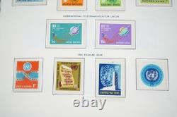 UN 1950s-1990s COLLECTION OF OVER 500 STAMPS ALL MINT STORED IN HARRIS ALBUM