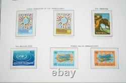 UN 1950s-1990s COLLECTION OF OVER 500 STAMPS ALL MINT STORED IN HARRIS ALBUM
