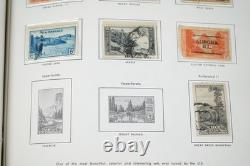 US 1890s-1970s COLLECTION OF 700+ STAMPS MINT & USED STORED IN HARRIS ALBUM