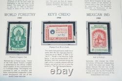 US 1960s COMMEMORATIVE COLLECTION OF 200 MINT STAMPS STORED IN WHITE ACE ALBUM