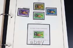 US 1960s JFK SPECIALIZED STAMP COLLECTION DUBAI-HUNGARY IN ALBUM