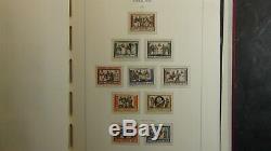 Vatican stamp collection in Lighthouse hingeless album withest. 900 or so MNH