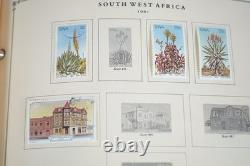 WORLDWIDE 1980s-1990s COLLECTION OF 1,550+ STAMPS MINT & USED IN SCOTT ALBUM